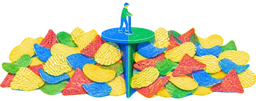 A mixed heap of chips split by a spinner rather than by hand, the two halves visibly alike.